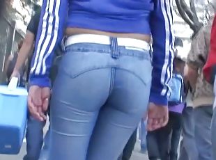 Amazing brunette in tight blue jeans a tight sweater candid porno